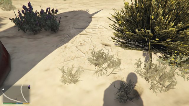 Le pylône est entouré d'inscriptions inintelligibles.